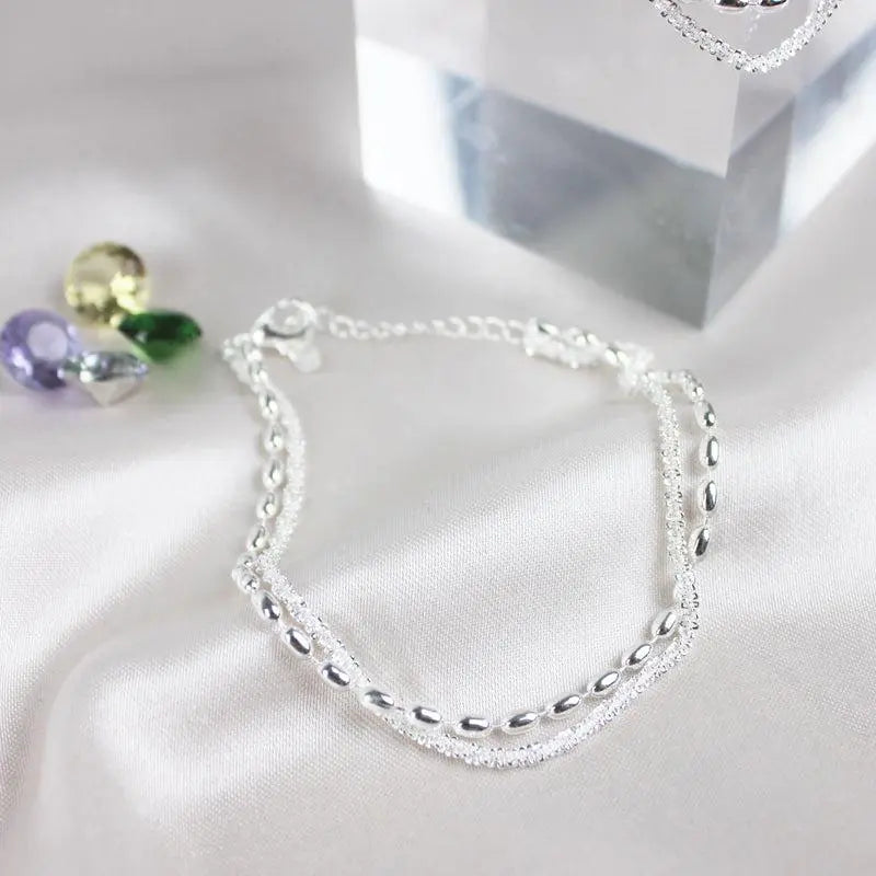Elegant Silver Bracelet Set with Zirconia Stones